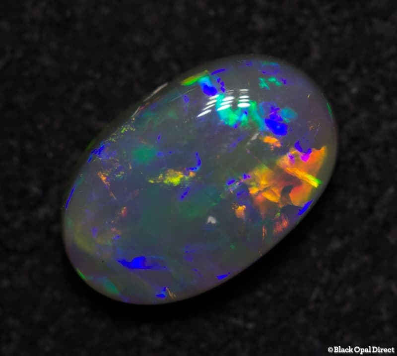 0.84 ct semi black opal 8x5x3mm