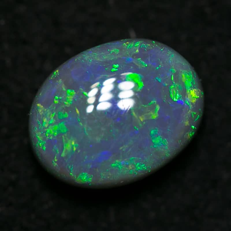 0.85 ct black opal 6.5x5x3mm