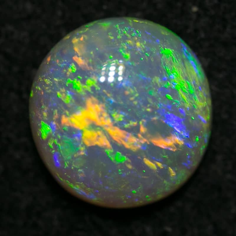 0.85 ct crystal opal 6.5mm round x 3mm