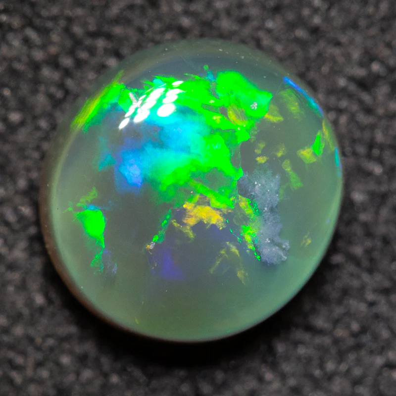 0.86 ct black crystal opal 6.2x6.2x3.3mm