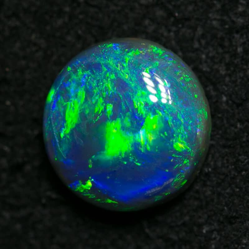0.86 ct black opal 6.5x6.5x3mm
