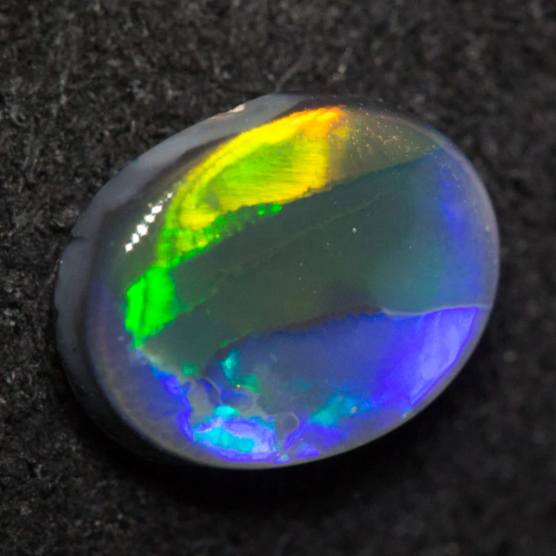 0.86 ct black opal 7.7x5.9x2.8mm