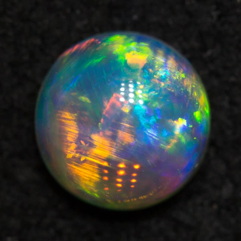 0.86 ct gem crystal opal 5mm round x3.4mm