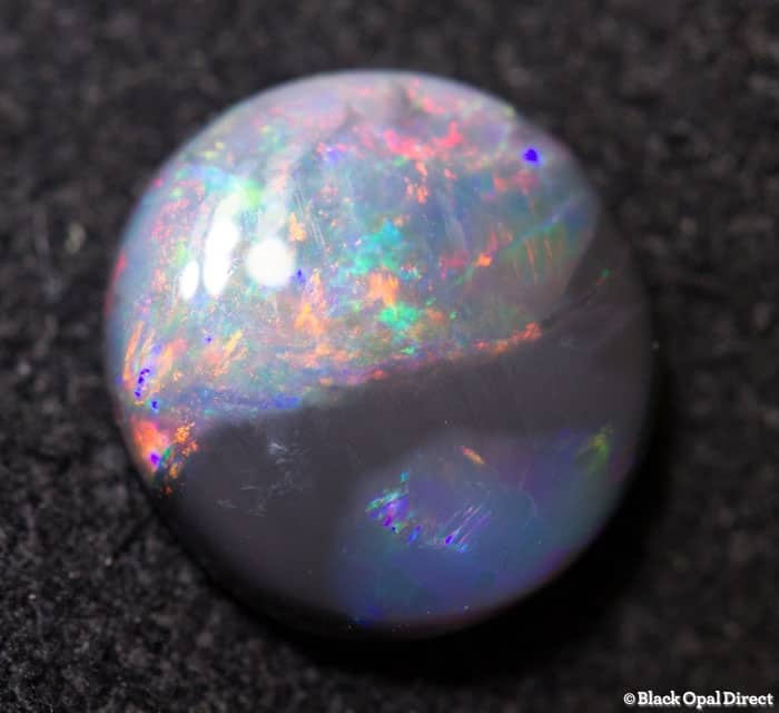 0.86 ct parti colored opal 8x7x2mm
