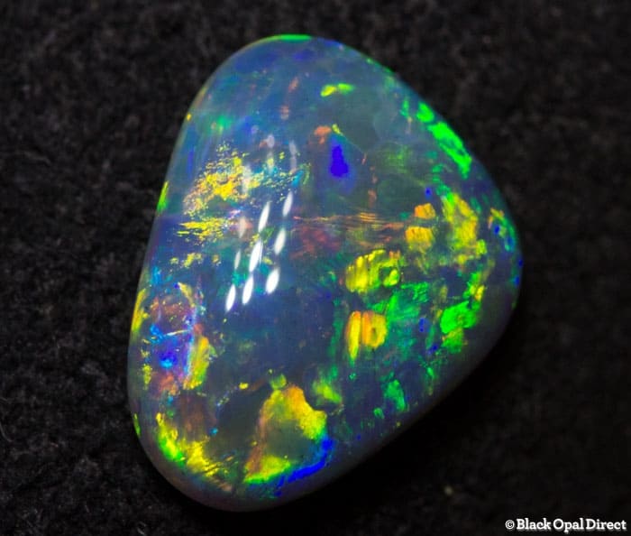 0.86 ct semi black crystal opal 8.5x7x2.5mm