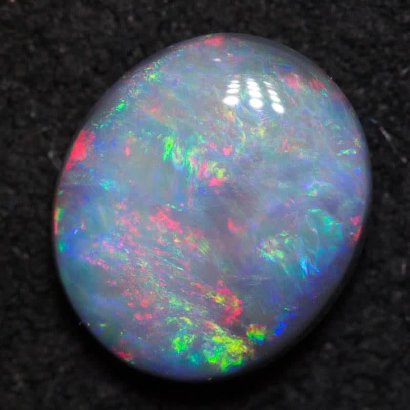0.87 ct black opal 7x6x2.5mm