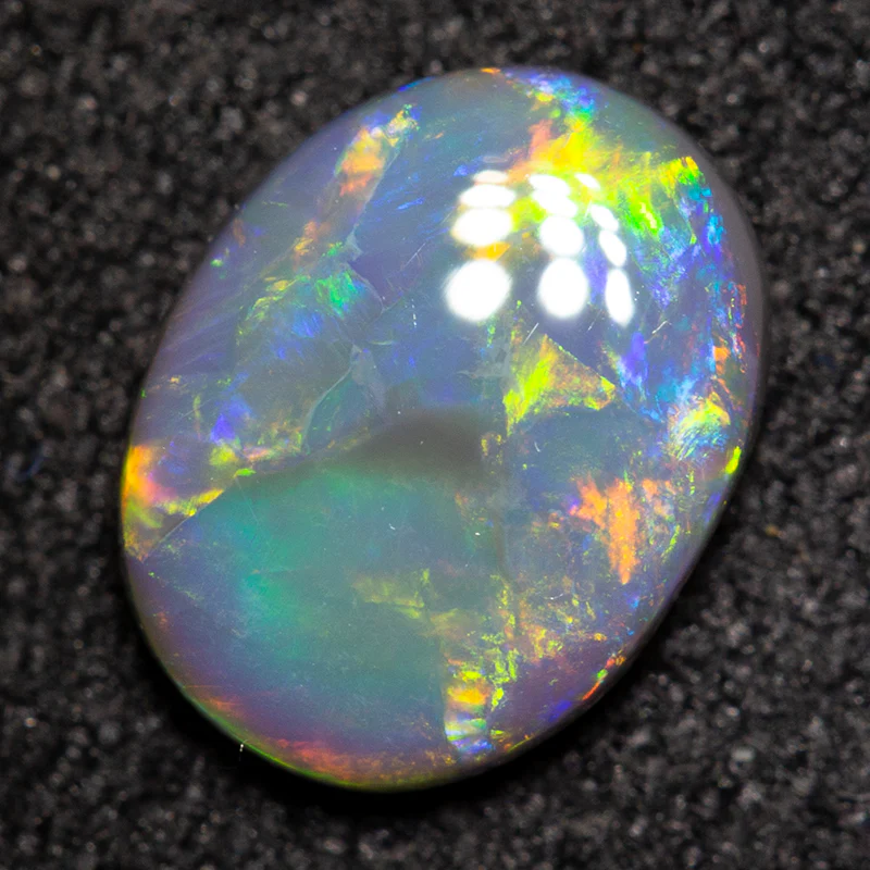 0.87 ct black opal 8.4x6.5x2.4mm
