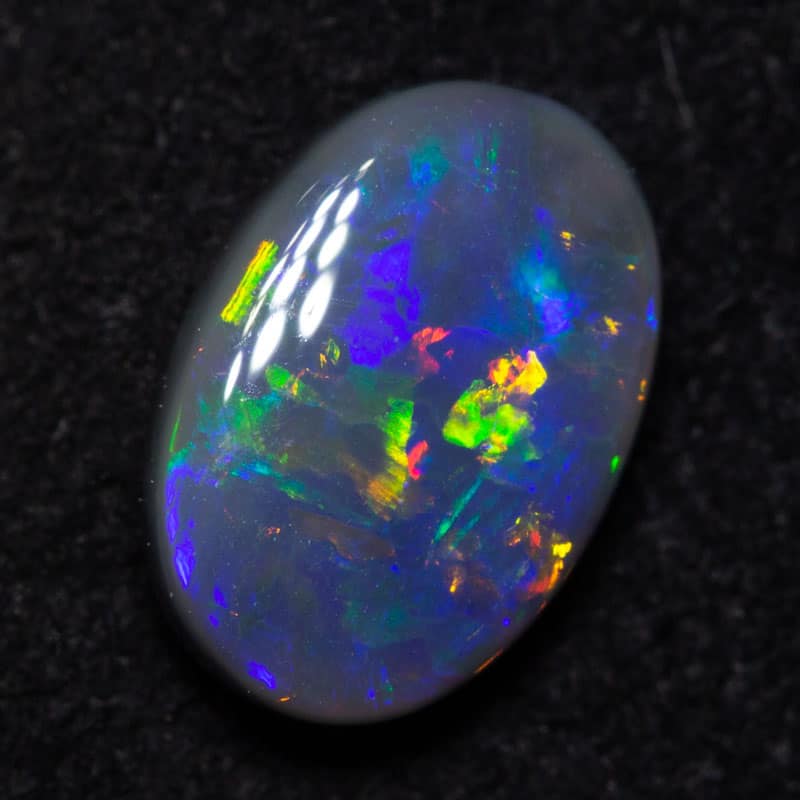 0.87 ct black opal 8x5x3.5mm
