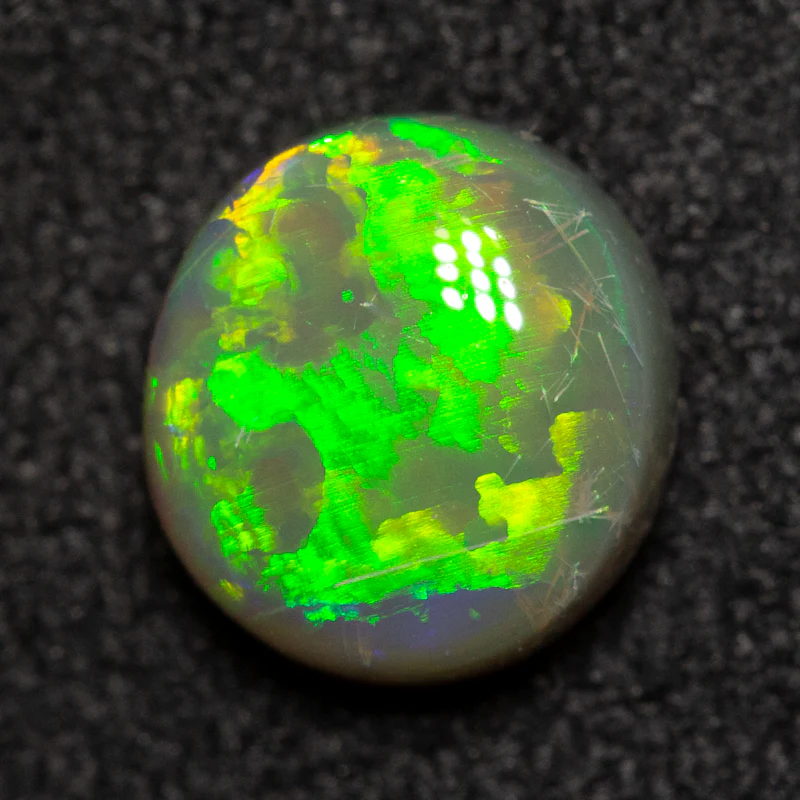 0.87 ct dark opal 6.7x6.2x3.4mm
