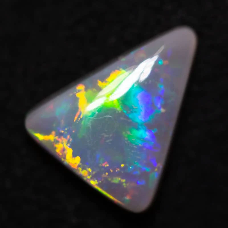 0.87 ct dark opal 8.5x7x2.6mm