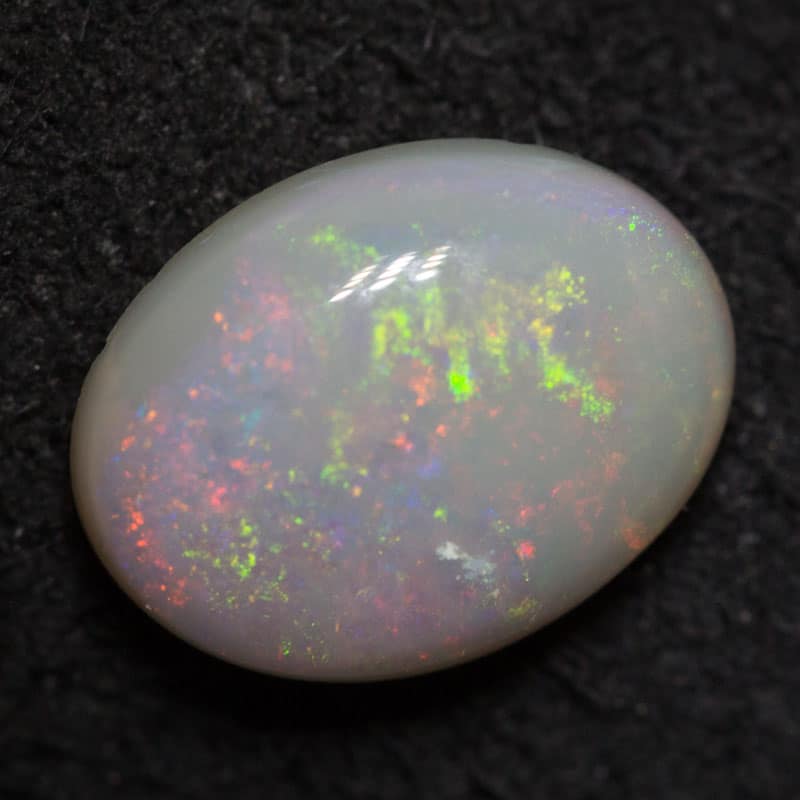 0.87 ct  dark opal 8x6mm