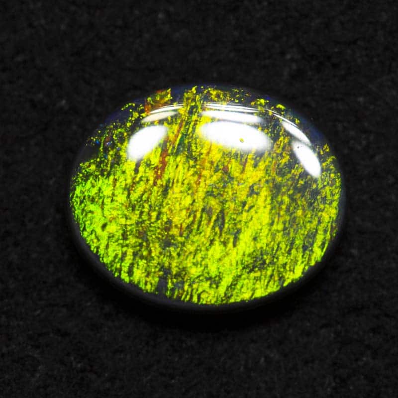 0.88 ct black opal 7.9x6.5x2.5mm