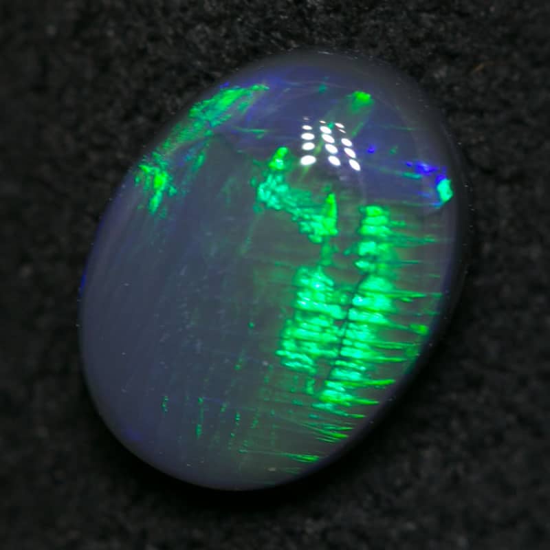 0.88 ct black opal 7x6x3mm - Image 3