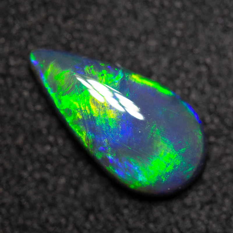 0.88 ct black opal 9.6x5x2.9mm