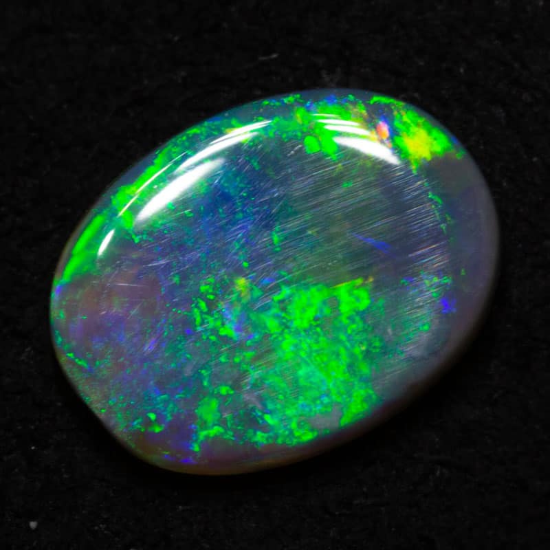 0.88 ct dark opal 8.4x6.4x2.3mm