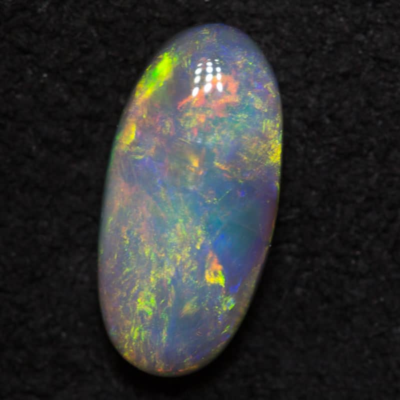 0.88 ct dark opal 9x4.5x2.5mm
