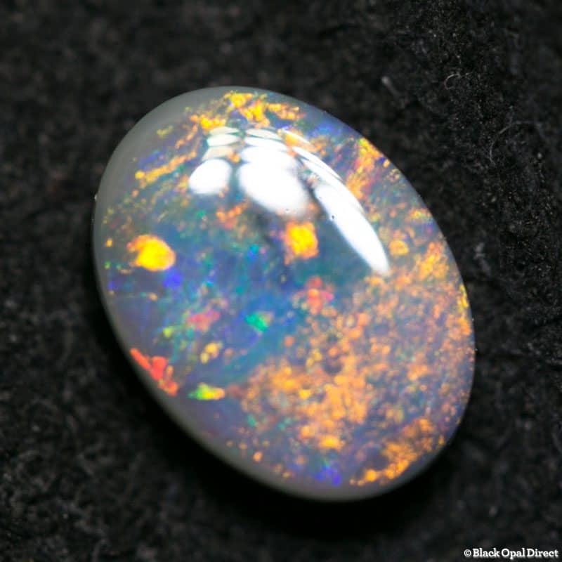 0.88 ct semi black opal 7.5x5.5x3mm