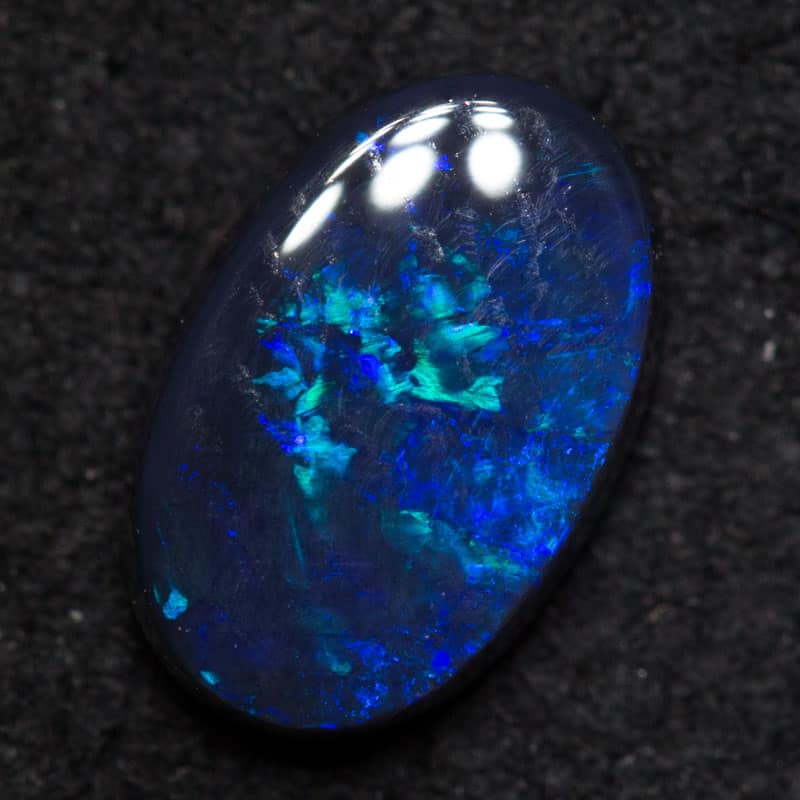 0.89 ct black opal 8.2x5.4x2.7mm