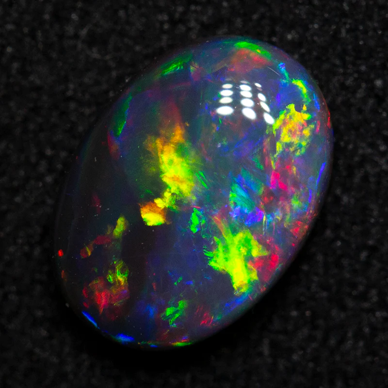 0.89 ct black opal 8x5.8x2.8mm