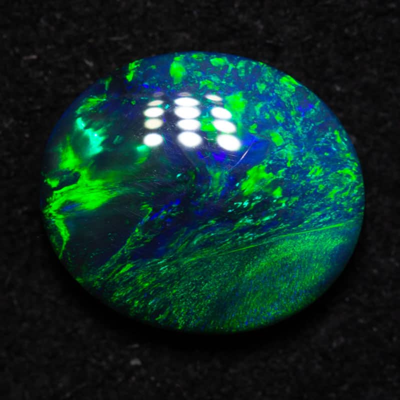 0.89 ct black opal 8x7x2.5mm