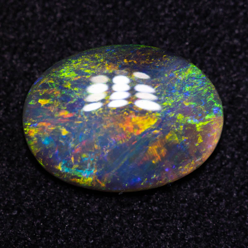 0.89 ct black opal 9.3x6.8x2.2mm