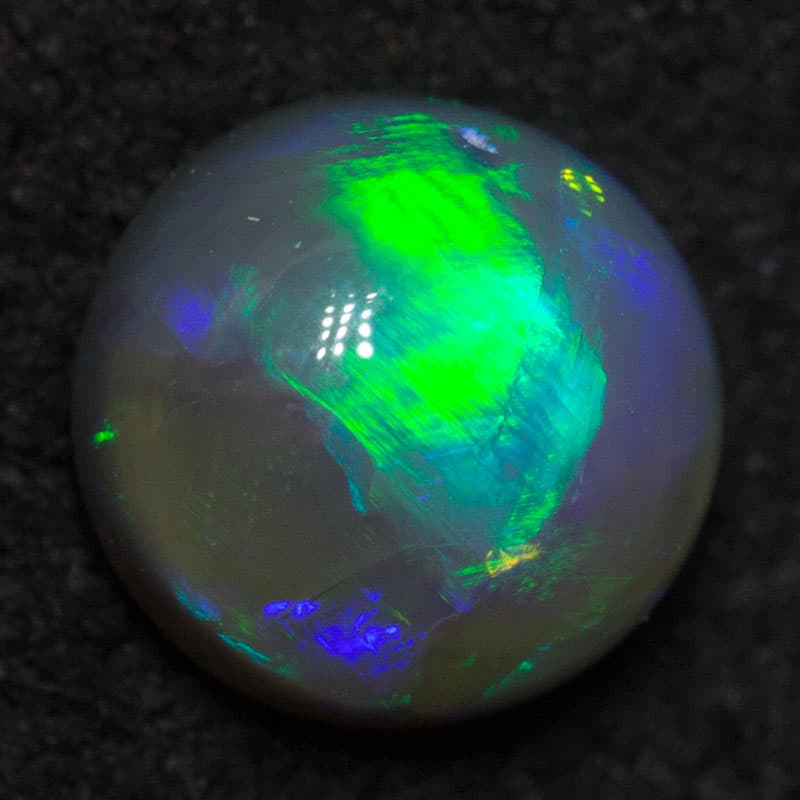 0.89 ct black opal star pattern 6x6x3.5mm