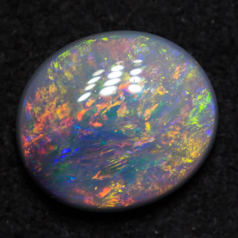 0.89 ct dark opal 7.5x6.5x2.8mm