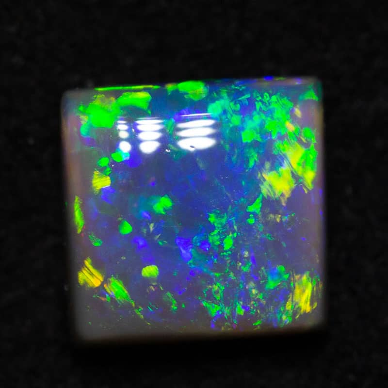 0.89ct black opal 5.7x5.5x3mm