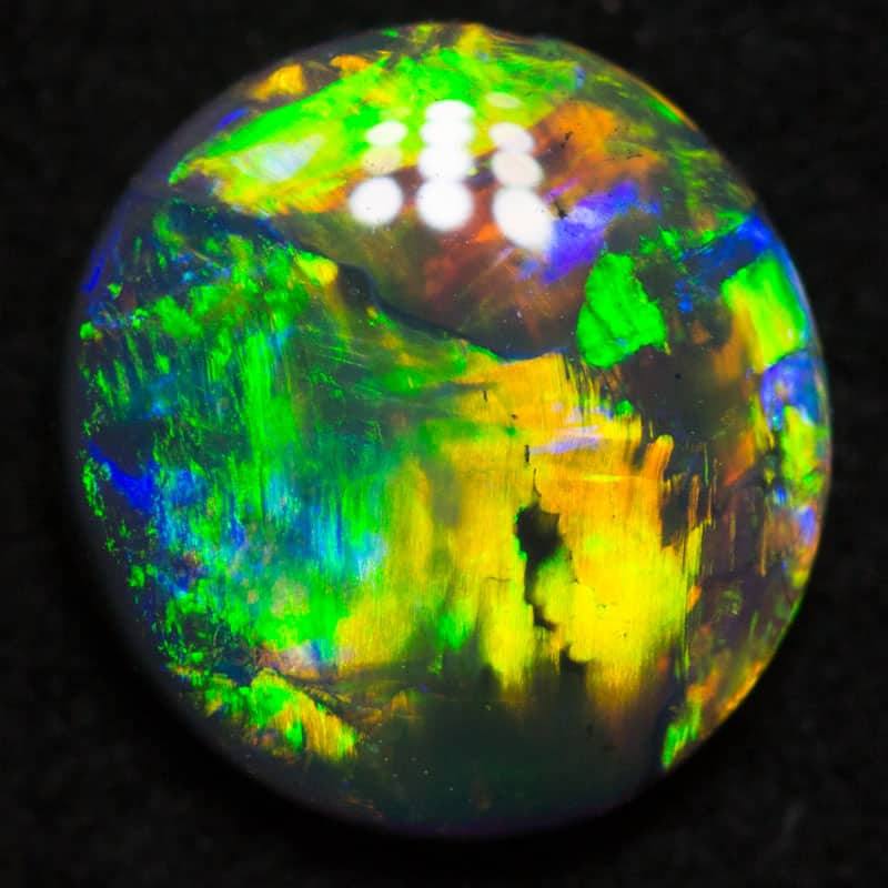 0.89ct black opal 7.6x7.3x2.4mm
