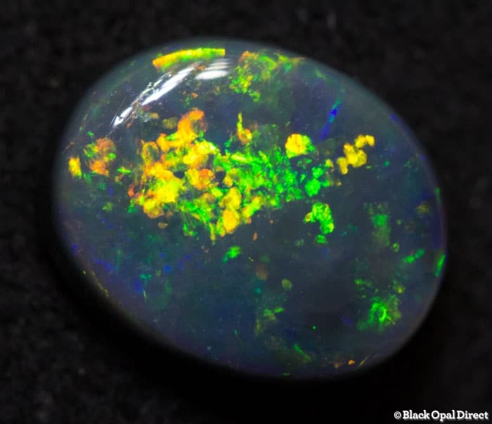 0.90 ct black opal 7.5x6x3mm