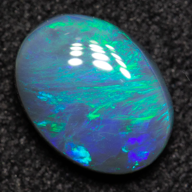 0.90 ct black opal 7.8x5.9x2.7mm