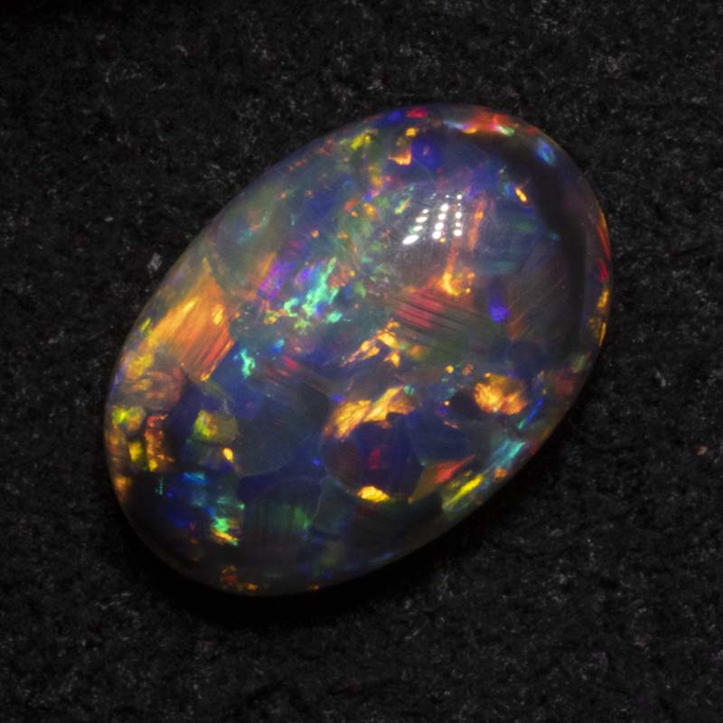0.90 ct black opal 7.9x5.4x3.4mm