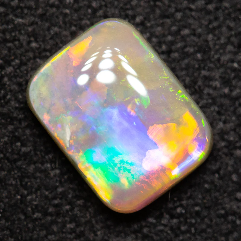 0.90 ct dark opal 6.8x5.2x2.9mm