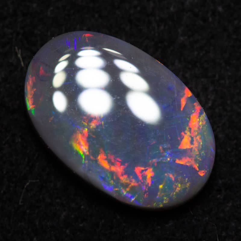 0.90 ct dark opal 9x6x2.5mm