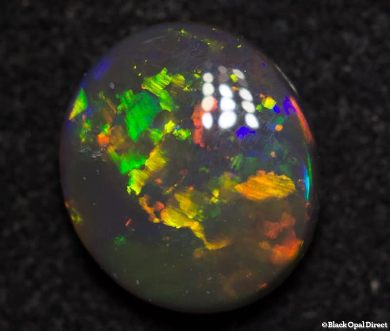 0.90 ct gem black opal 7.5x6.5x3mm