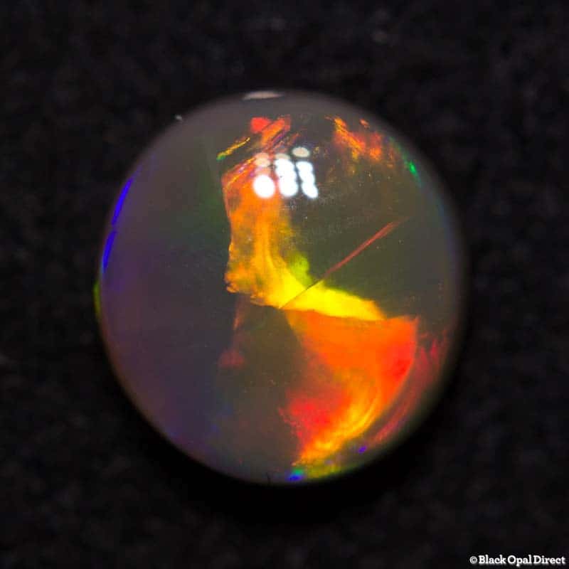 0.90 ct semi black opal 6.5x6.3mm