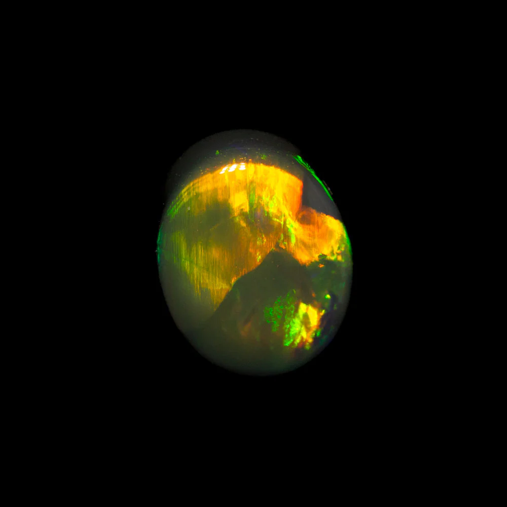0.91 ct black opal 7.2x5.6x3.1mm