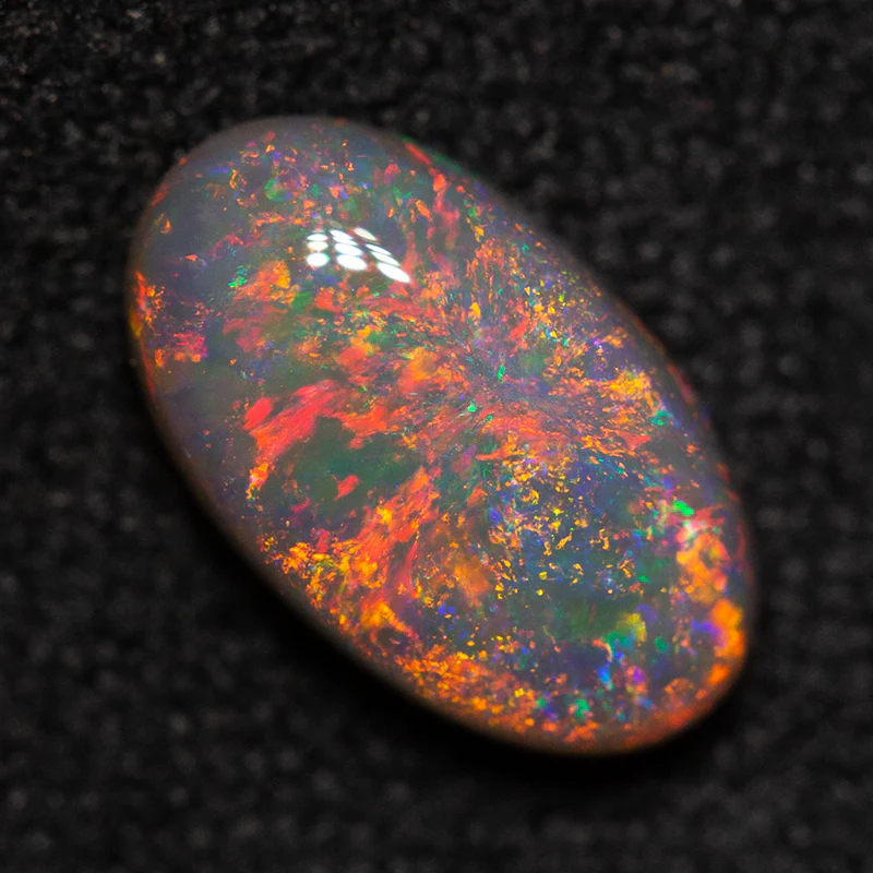 0.91 ct dark opal 8.9x5.2x3mm