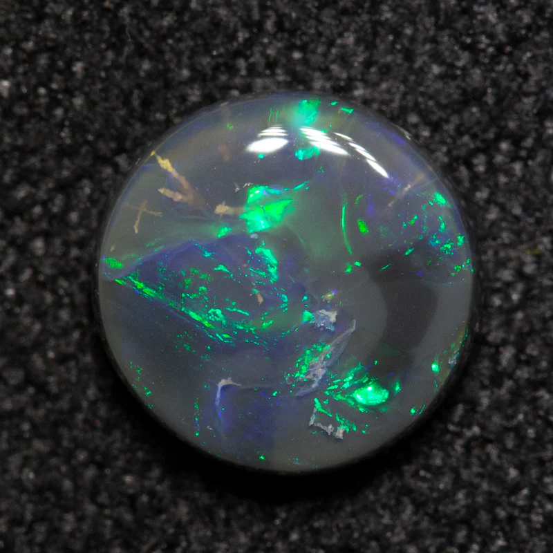 0.92 ct black opal 6.9x6.8x2.6mm