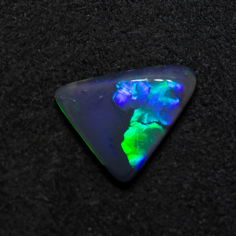 0.92 ct black opal 8.4x7.7x2.6mm