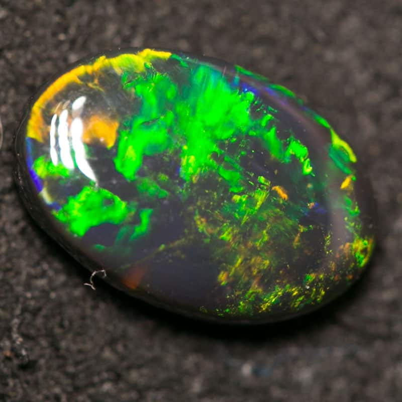 0.92 ct black opal 8.5x6x3mm