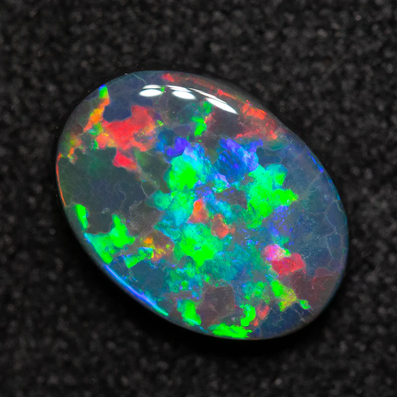 0.93 ct black opal 8.4x6.2x2.6mm