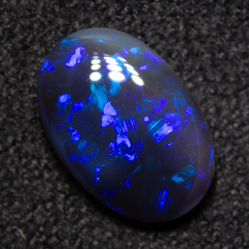 0.93 ct black opal 8.7x5.9x2.8mm