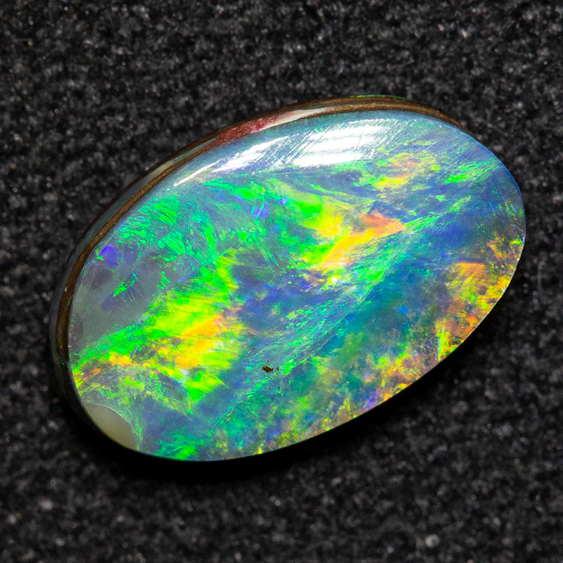 0.93 ct boulder opal 8.6x5.6x2.3mm