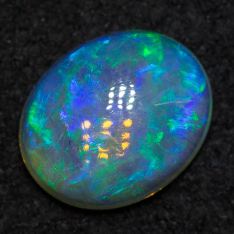 0.93 ct double sided crystal opal 7.4x6.1x3.3mm