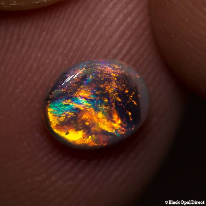 0.93 ct double sided semi black opal 7.5x6x3mm
