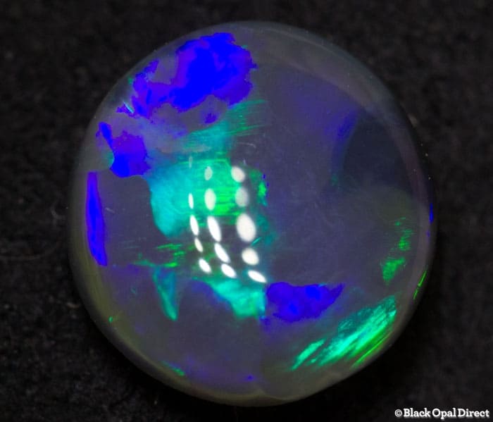 0.93 ct semi black opal 7x7x3mm