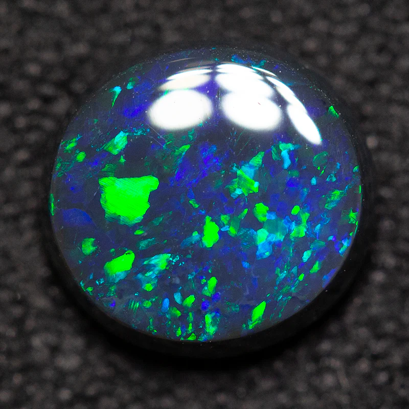 0.94 ct black opal 6.9x6.6x3mm