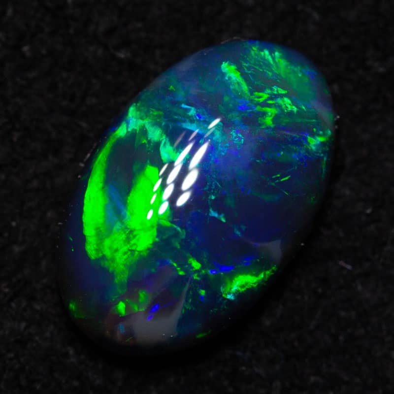 0.94 ct black opal 8.6x5.5x3.1mm