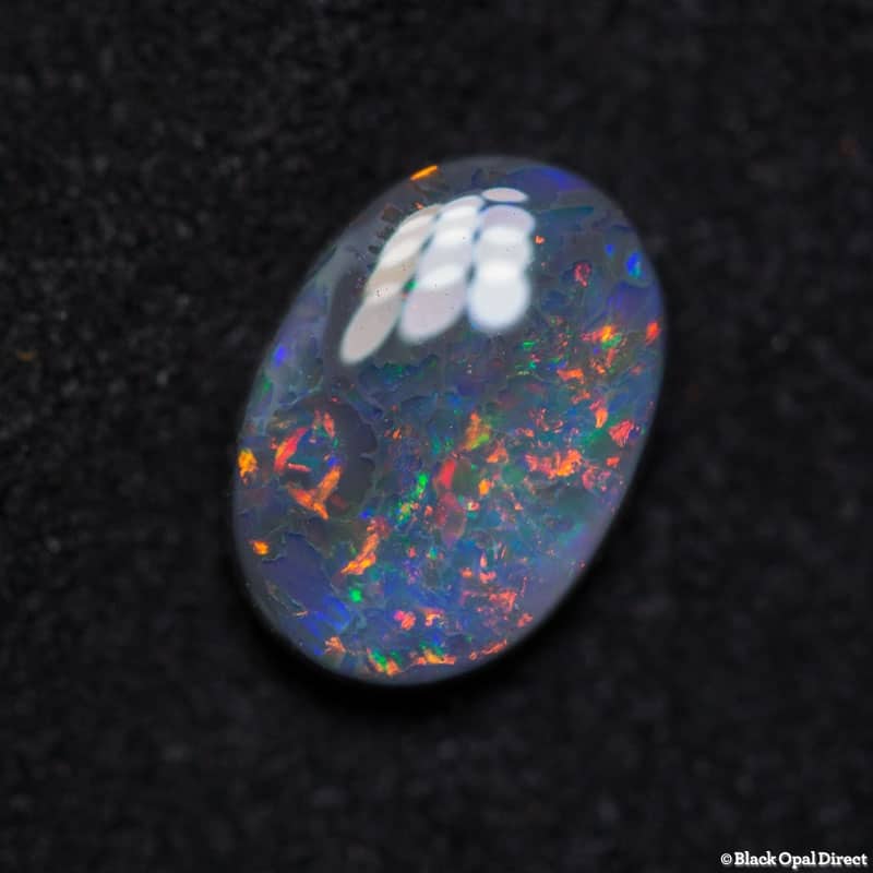 0.94 ct black opal 8x6x2.5mm